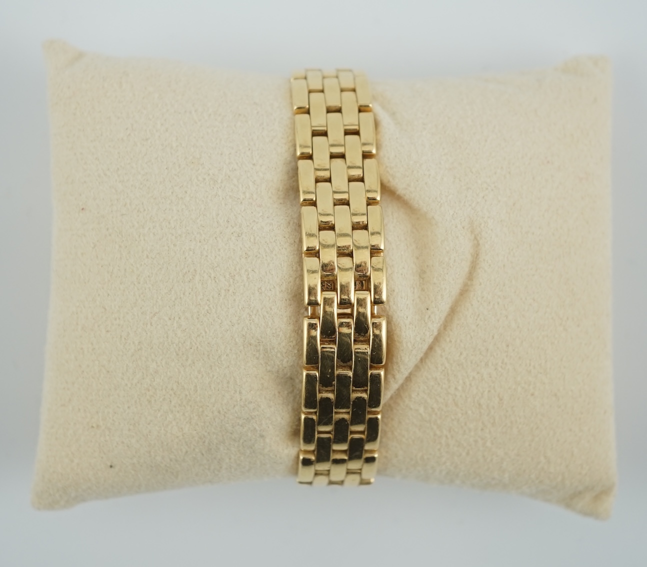 A lady's 18ct gold Cartier Panthere quartz wrist watch